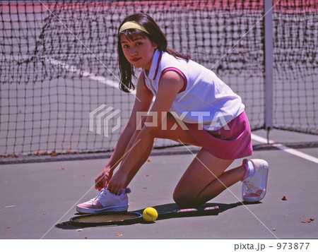 テニスコート 女性 テニスの写真素材