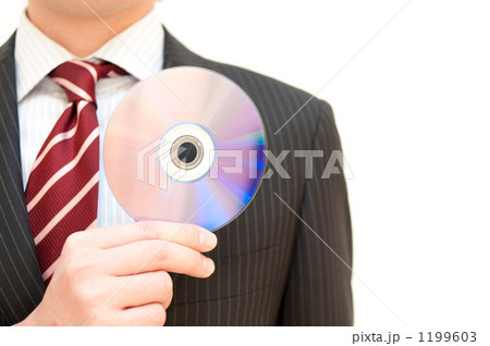 CDROMを持つビジネスマン 1199603