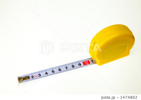 Top view of yellow soft measuring tape. Minimalist flat lay image of tape  measure with metric