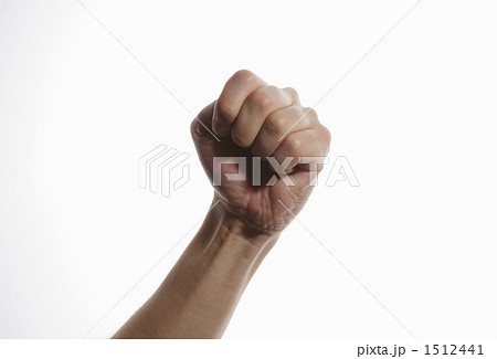 拳をあげる男性の手の写真素材