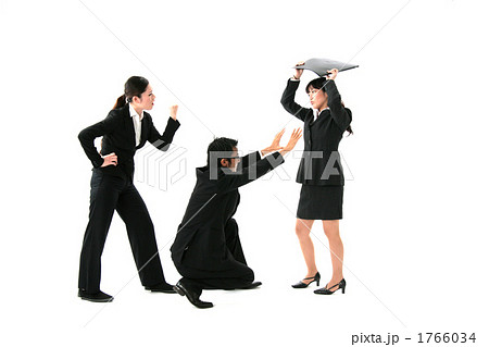 喧嘩する女子社員を止める係長の写真素材