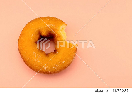 食べかけのドーナツの写真素材