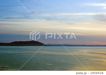 サロマ湖畔より望む　キムアネップ岬の夕景 1950428