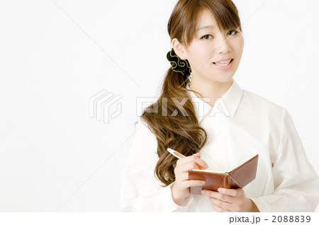 手帳と女性 2088839