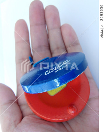 カスタネットと手の写真素材