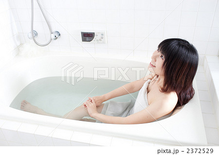 A woman taking a bath - Stock Photo [48982588] - PIXTA