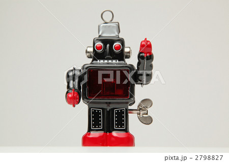 ブリキのロボット正面 左手挙手の写真素材