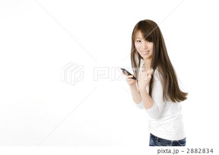 スマートフォンとガッツポーズの女性 2882834