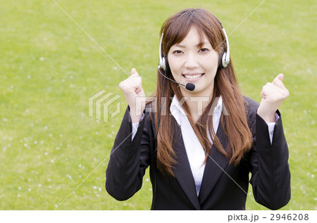 ヘッドセットのOL（ガッツポーズ） 2946208