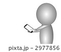 スマートフォンをいじる人物 2977856