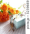 オレンジの花束とギフト 3239669