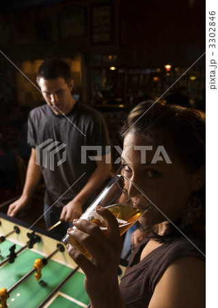 Woman drinking beer. 3302846