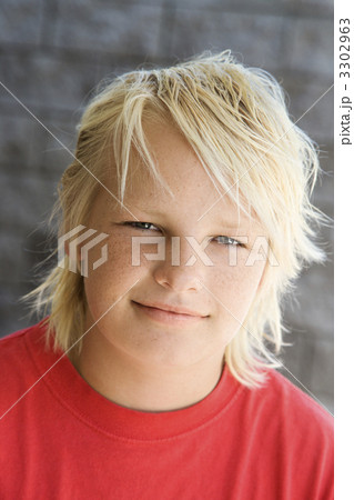 Blonde boy smiling. 3302963