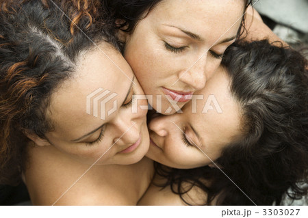 Three women embracing. Three women embracing. 3303027