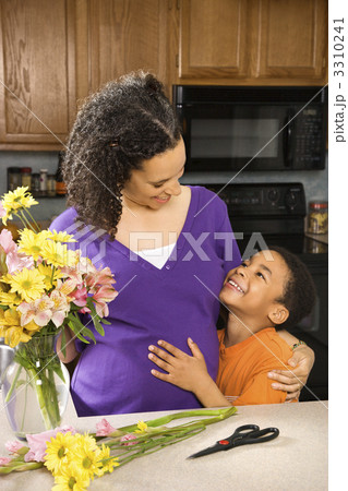 Pregnant mother and son. 3310241
