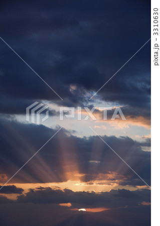 Sunbeams coming through clouds. Sunbeams coming through clouds. 3310630