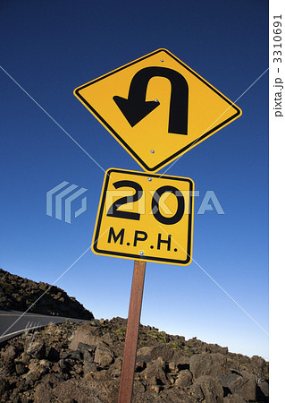 Road curve and speed limit sign. Road curve and speed limit sign. 3310691
