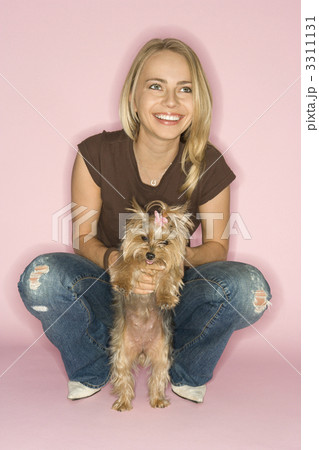 Woman with Yorkshire Terrier dog. 3311131
