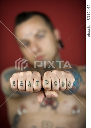 Man with tattoos. 3312142