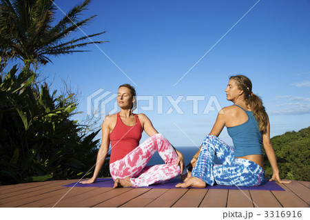 Women Doing Yoga Outdoors 3316916