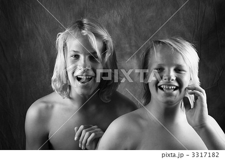 Two young brothers laughing. Two young brothers laughing. 3317182