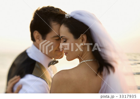 Newlywed Couple on Beach 3317935