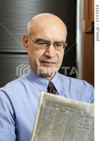 Businessman reading newspaper. Businessman reading newspaper. 3343959
