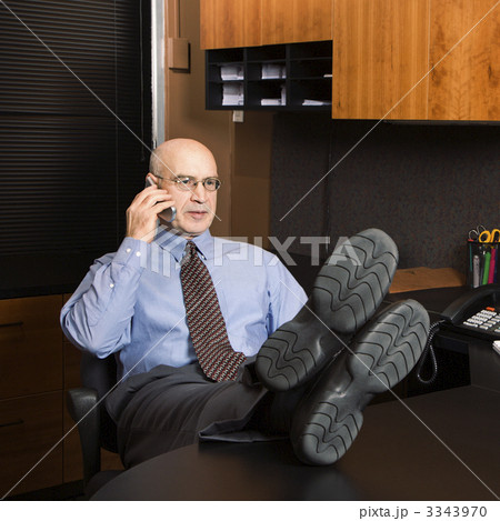 Businessman on cellphone. Businessman on cellphone. 3343970