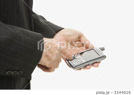 Businessman using PDA. 3344019