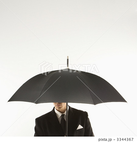 Businessman with umbrella. 3344367