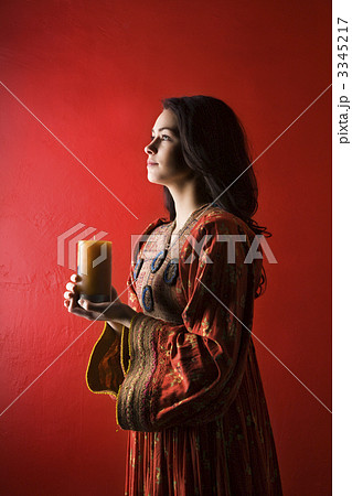 Young Woman Holding Candle Young Woman Holding Candle 3345217