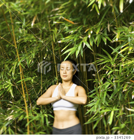 Asian woman meditating. 3345269