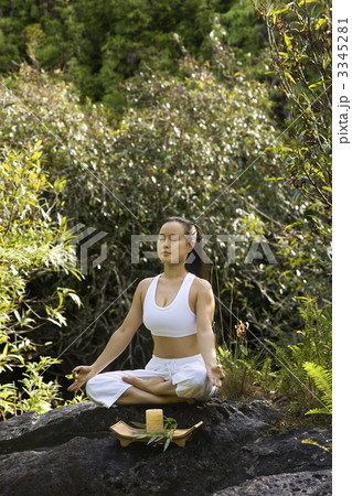 Asian woman meditating. 3345281