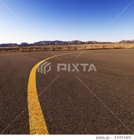 Yellow line on airport tarmac. 3345569