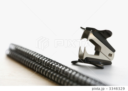 Staple remover on notebook. 3346329