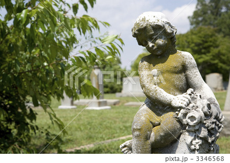 Cherub statue at graveyard. 3346568