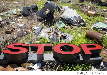 Letters spelling STOP in trashy junkyard. Letters spelling STOP in trashy junkyard. 3346737