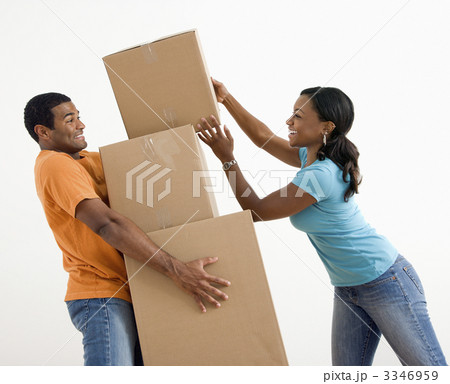 Couple with moving boxes. 3346959