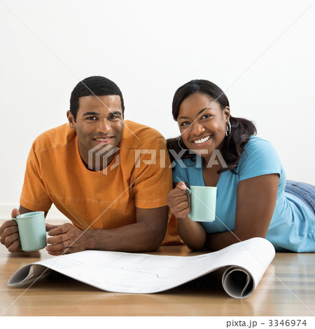 Couple with blueprints. 3346974