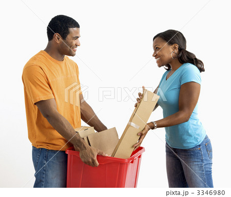 Man and woman recycling. 3346980