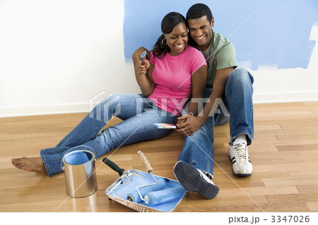 Couple relaxing on floor. Couple relaxing on floor. 3347026