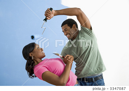 Man being playful with woman. 3347087