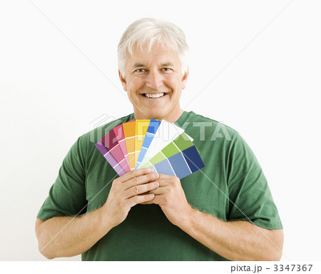 Man with paint swatches. 3347367