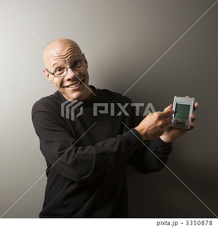 Man pointing to PDA. Man pointing to PDA. 3350878