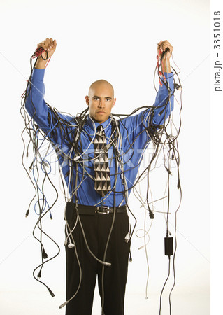 Man wrapped in cables. Man wrapped in cables. 3351018
