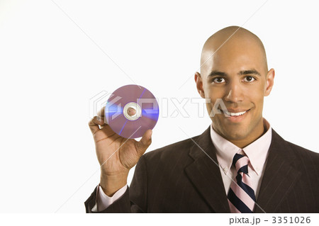 Man holding compact disc. Man holding compact disc. 3351026