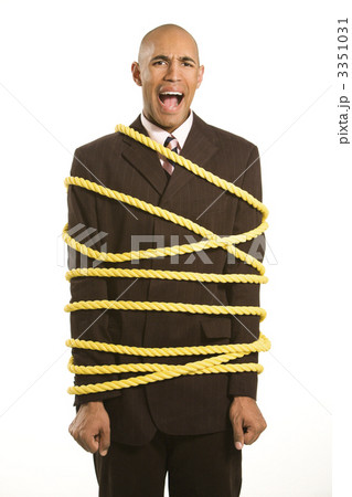 Businessman tied in rope. 3351031