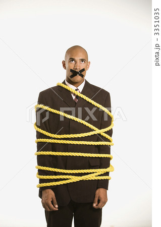 Businessman tied in rope. Businessman tied in rope. 3351035