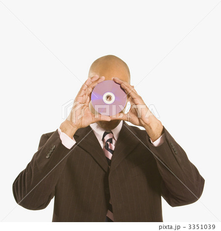 Man holding compact disc. Man holding compact disc. 3351039