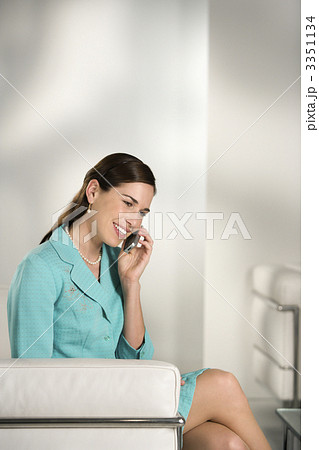 Business woman on cell phone. Business woman on cell phone. 3351134